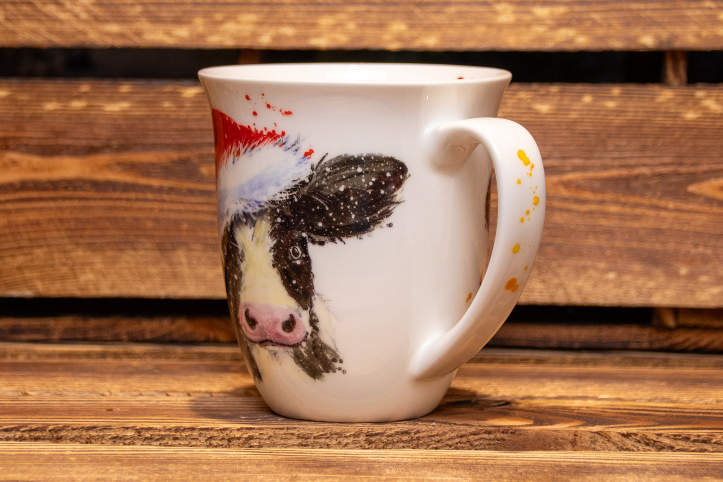 Kuh mit Weihnachtsmütze